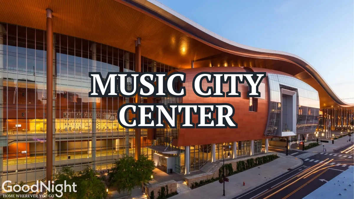 An exterior view of the Music City Center building surrounded by lively streets and curated landscaping, suggesting a hub for concerts, conventions, and cultural events in Nashville.